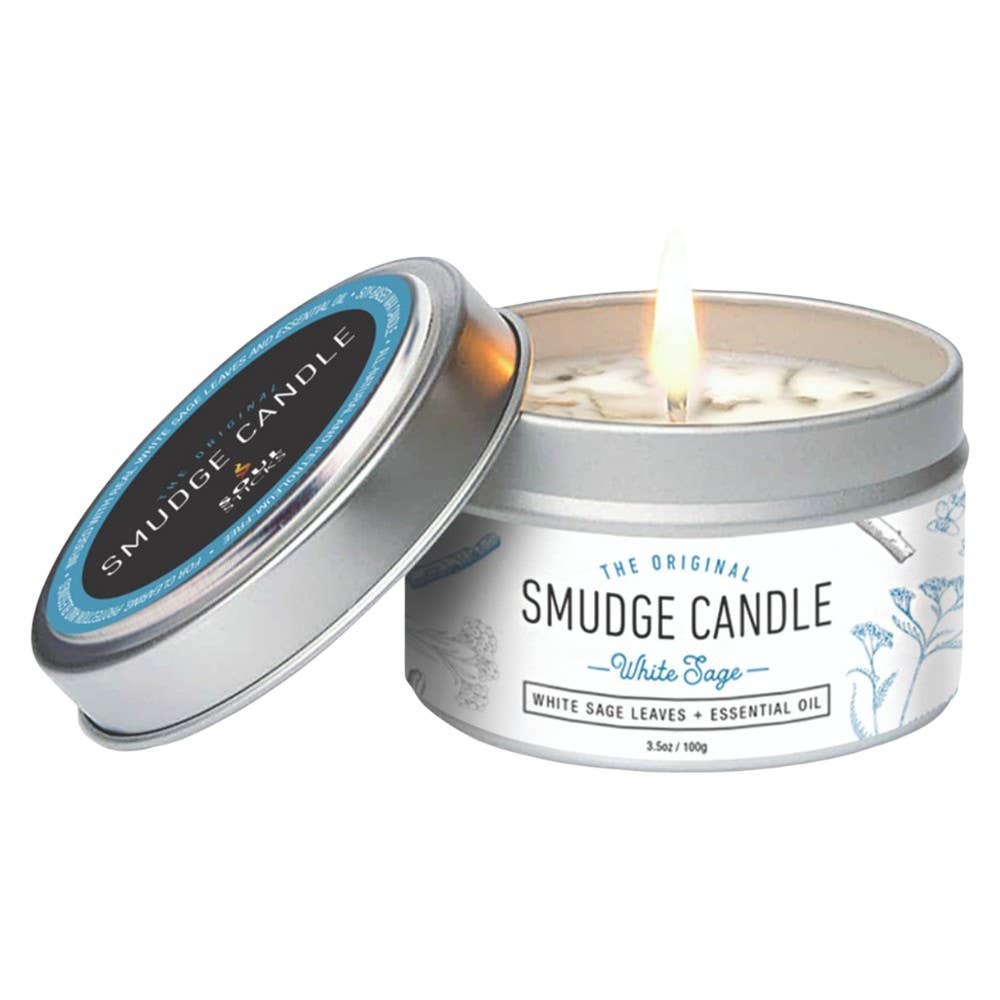 Smudge candle in a tin with a lit candle inside, on a white background