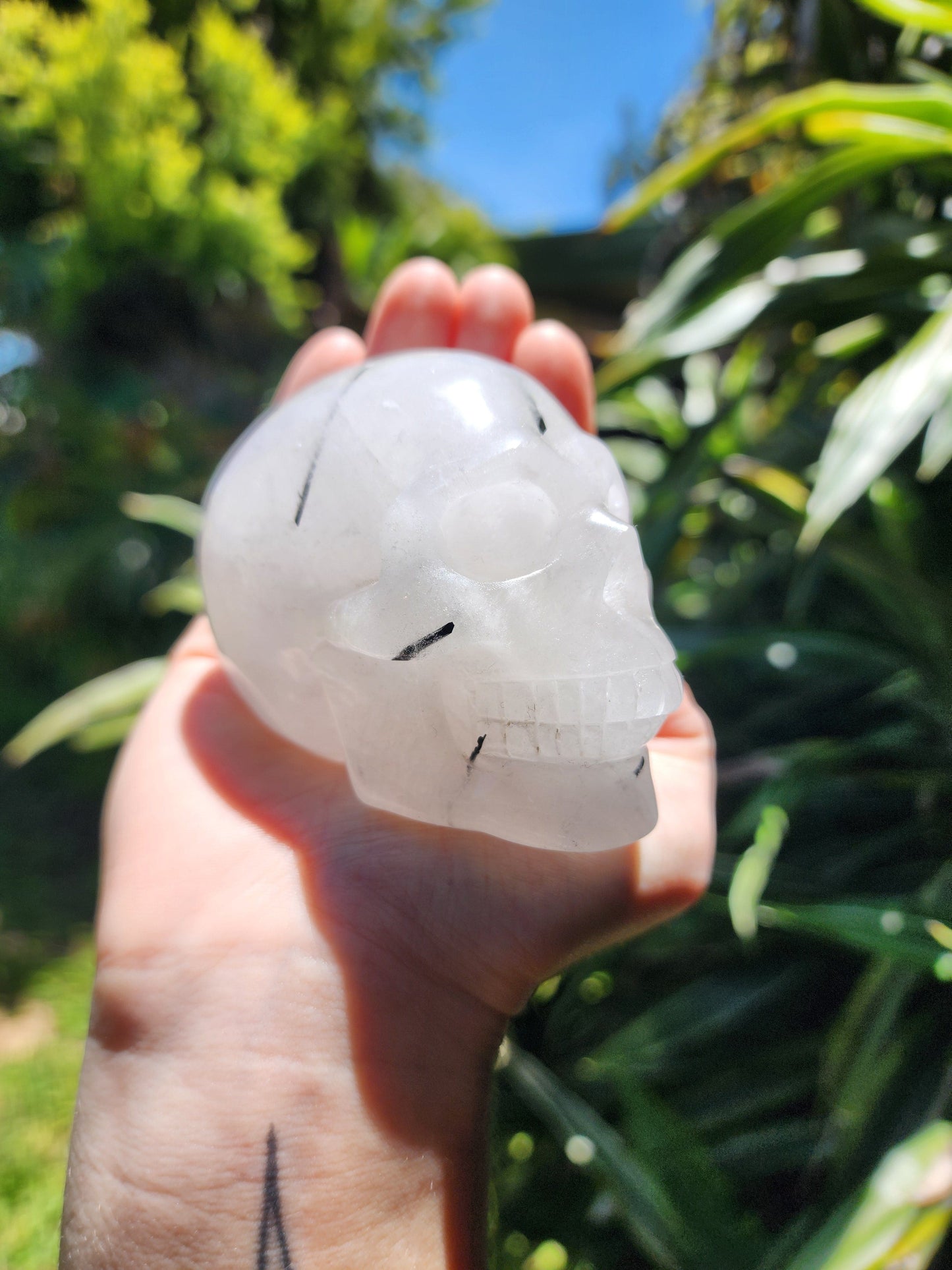 Carving Tourmalinated Quartz Crystal Skull Carving